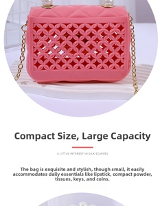 Detail of pink hollow-out jelly bag with pearl accents and golden chain strap