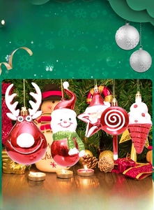 Macro shot of red and white glitter Christmas ornaments including reindeer and snowman