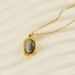 Vintage 18K gold plated stainless steel necklace with blue-grey oval gemstone pendant