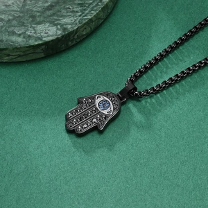 Classic black Hamsa Hand pendant necklace with CNC micro-pave crystals and blue eye detail