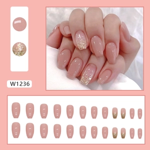 Short ballet pink press-on nails set with gold glitter accents and glossy finish