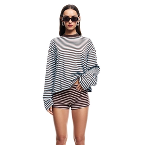 Detail showing brown and light blue horizontal striped long sleeve top with matching shorts