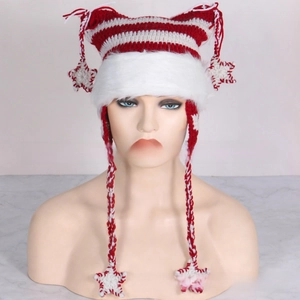 Detail of red and white striped crochet hat with cat ears and fluffy white faux fur trim
