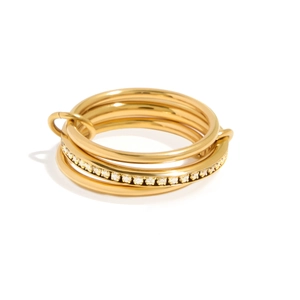 Modern layered gold-plated stainless steel ring featuring a sparkling zircon pavé band