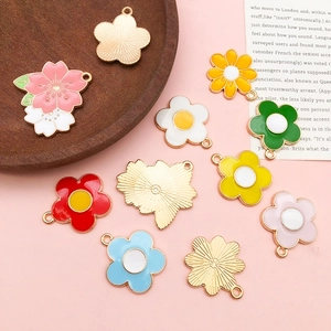 Mixed set of ten colorful enamel daisy and cherry blossom alloy flower charms