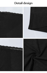 Detail view of black ribbed knit fabric and delicate lace trim on the slim fit camisole top