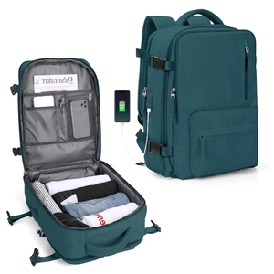 Detail of teal travel backpack with USB port and large open internal storage capacity