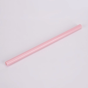 Detail view of pink Tritan plastic straw with 1cm diameter and smooth finish