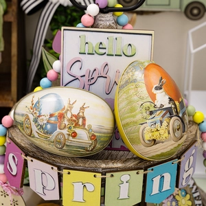 Easter tin egg candy boxes with vintage bunny car prints and spring decor items