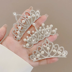 Three elegant silver kids crown hair combs featuring sparkling rhinestones and pearls