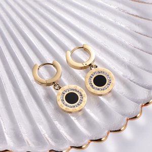 Elegant 18k gold plated roman numeral earrings with black inlay in a minimalist style