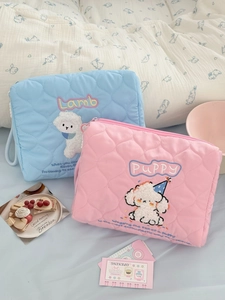 Quilted travel pouch with cute lamb and puppy embroidery in blue and pink pastel colors