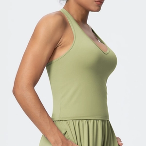 Side view of light green V-neck sports bra and high-elastic yoga leggings for fitness