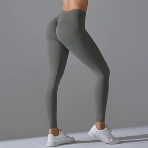 Detail of high-waisted seamless yoga leggings with V-shaped waistband and scrunch butt effect