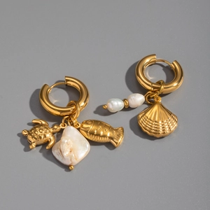 Detail of gold titanium earrings with sea turtle, shell, and baroque pearl pendants