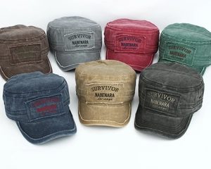 Detailed display of vintage flat top military caps in seven colors with survivor embroidery