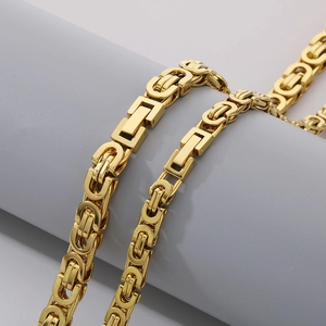 Chic hip-hop gold plated stainless steel flat link chain necklace on display stand
