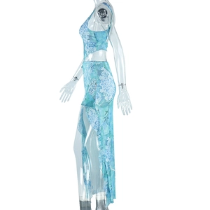 Detail view of sky blue floral print irregular top and split hem maxi skirt set