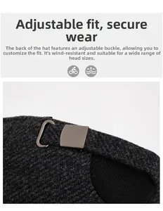 Detail of adjustable metal buckle and strap on dark grey winter wool baseball cap