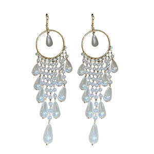 Exaggerated golden circle drop earrings with cubic zirconia and faux pearl tassels