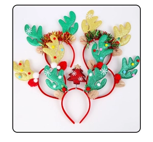 Detail showing a colorful collection of glittery Christmas reindeer antler headbands