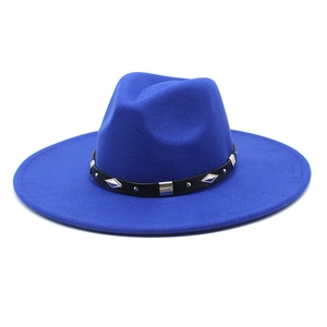 Close-up of royal blue wool fedora featuring a black leather band with silver studs