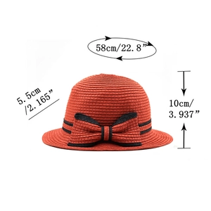 Chapeau de paille rouge brique avec ruban noir et mesures de bord et de couronne