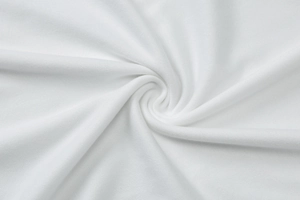 Gros plan détaillé de la texture du tissu en maille blanc respirant et du coton doux