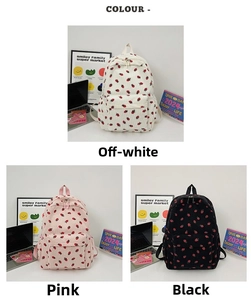 Three-color corduroy backpacks with strawberry embroidery shown in white, pink, and black