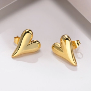 Polished gold heart stud earrings for women in stainless steel with a high-gloss finish