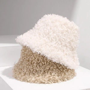Winter faux shearling bucket hats in beige and khaki with cozy plush texture