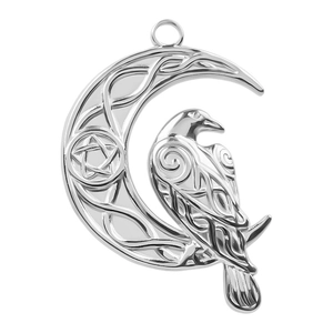 Detailed close-up of a silver moon pendant featuring a raven, pentagram, and Celtic knot