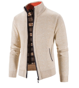 Detail view of men's fleece knit cardigan with orange collar accent and plaid lining