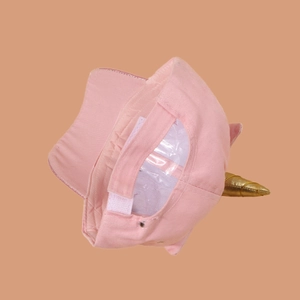 Detail of pink unicorn kids cap showing interior lining, stitching and adjustable strap