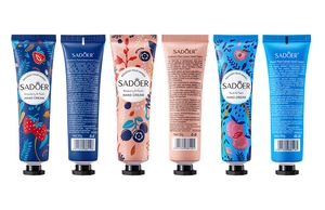 Detail van SADOER fruit handcrèmes in aardbei, bosbes en perzik tubes van 30g