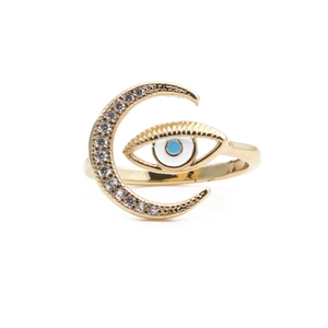 Detailed view of the gold moon ring with micro-set zircons and enamel evil eye design