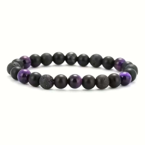 Detailansicht der Tigerauge-Perlen und schwarzen Lavasteinperlen am elastischen Armband