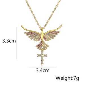 Detailed view of gold bird and cross pendant with dimensions 3.3x3.4cm and 7g weight
