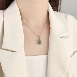 Elegant S925 silver heart lock necklace with shell inlay on a minimalist bead chain