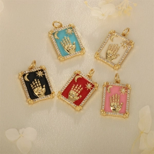 Hamsa Hand tarot pendants in 18k gold plated copper with colorful enamel and zircon stones