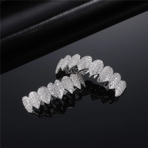 Silver-plated hip-hop grillz set featuring sparkling iced-out pave cubic zirconia stones