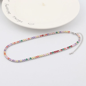 Detailed shot of multi-color zircon tennis necklace with square-cut gems and lobster clasp