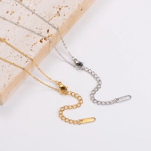 Minimalist matte butterfly necklace chains in gold and silver steel on stone base