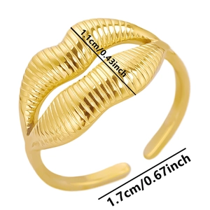Detail showing the 1.1cm height and 1.7cm diameter of this gold lip-shaped open ring
