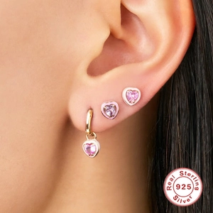 Pink heart-shaped cocktail hoop earrings in gold-plated 925 sterling silver on ear