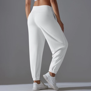 Vue arrière détaillée du pantalon de jogging blanc à taille haute pour fitness et course