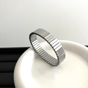 Minimalist silver stainless steel stretch bracelet with vintage watch strap link design