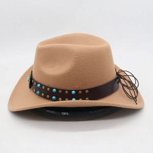 Detail of camel wool cowboy hat featuring brown leather band with turquoise beads