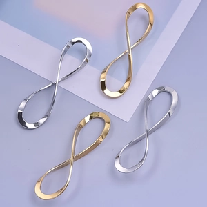 Polished gold and silver stainless steel infinity figure-eight pendants set of four pieces