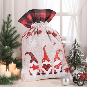 Sacchetto regalo di Natale in lino con tre gnomi e stampa festiva Merry Christmas